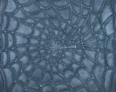 фото Чугунная плитка "Паутинка"