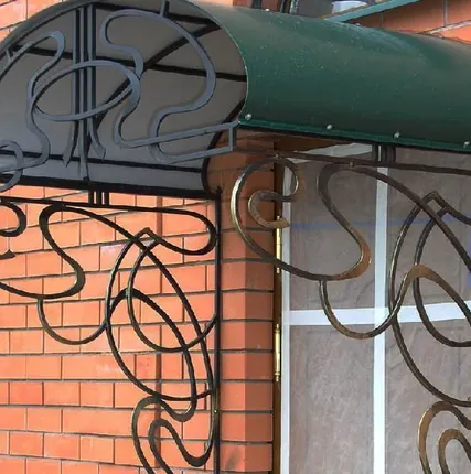 Фото №0 Кованый козырек №9