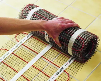 фото Укладка теплого пола матом