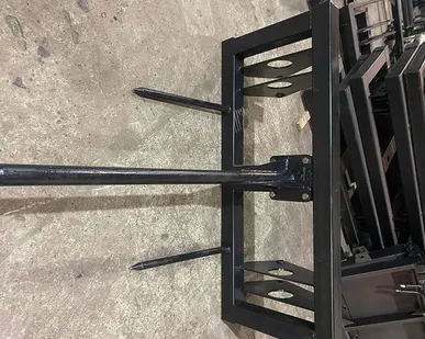 фото Вилы для рулонов тюковые для фронтального погрузчика ПФУ-1200