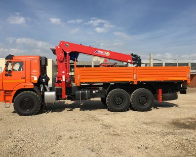 фото Бортовой КАМАЗ-43118 с тросовым КМУ HORYONG HRS 216
