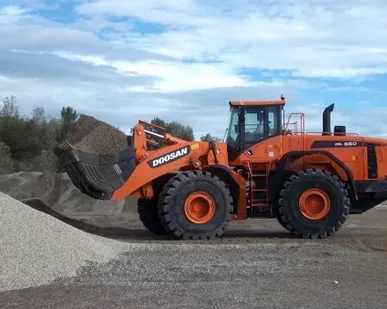 фото Погрузчик DOOSAN DL 550A, новый 2014 года выпуска, ковш - 5,4 куб.м.