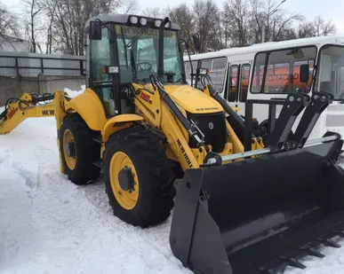 фото Экскаватор-погрузчик New Holland B115B (Трактор)