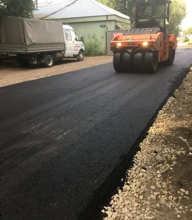 Фото №0 Устройство дорожного покрытия из крупнозернистого асфальтобетона