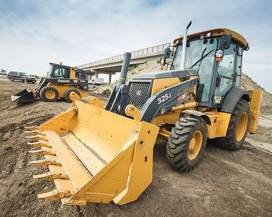 фото Экскаватор погрузчик John Deere 325 Экскаватор-погрузчик