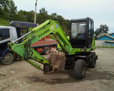 фото Экскаватор колесный Hyundai Robex 555WM