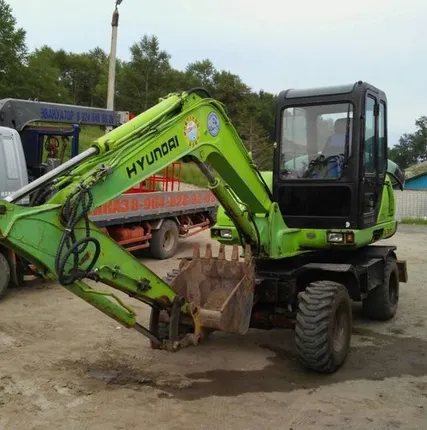 Фото №0 Экскаватор колесный Hyundai Robex 555WM