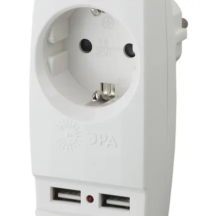 Фото №1 Адаптер SP-1e-USB-W "Polynom" 1-м 220В+ 2хUSB 2100мА c зазeмл. бел. ЭРА Б0026332