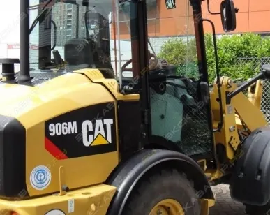 фото Аренда фронтального погрузчика (колесного) Caterpillar 906K, Москва