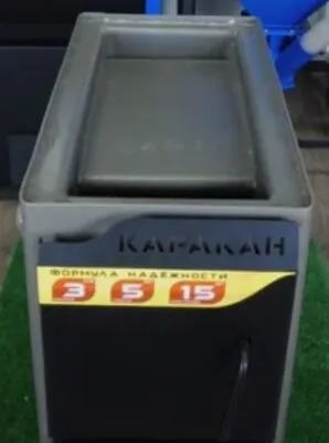 Фото №10 Котел на твердом топливе Каракан 20 ТПЭ 3, 20 кВт с плитой