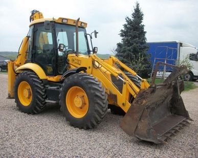 фото Копка траншей экскаватором JCB 4CX