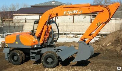 Фото №0 ЭксМаш E160W колесный экскаватор.