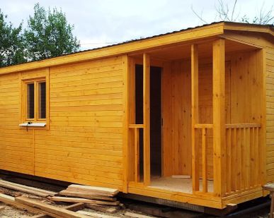 фото Вагон бытовка с перегородкой 2300 х 6000 (отделка вагонка)