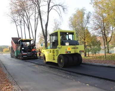 фото Асфальтирование дороги из асфальтной крошки