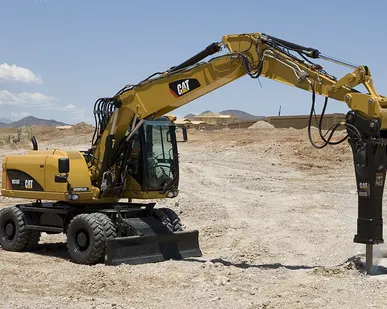 фото Аренда экскаватора с гидромолотом