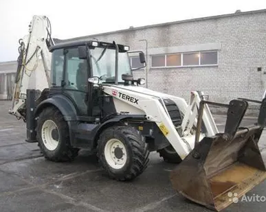 фото Аренда и услуги экскаватора-погрузчика KOMATSU с гидромолотом