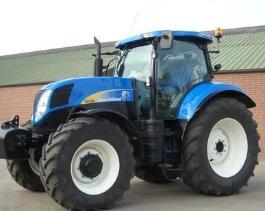 фото Сельскохозяйственный трактор NEW Holland T6090