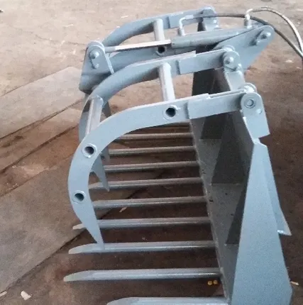 Фото №1 Вилы с прижимом на фронтальный погрузчик экскаватор-погрузчик мини-погрузчик