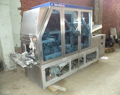 фото упаковщик готовой продукции в картонные короба Tetra Pak TCPB-70 Б/У в Краснодаре
