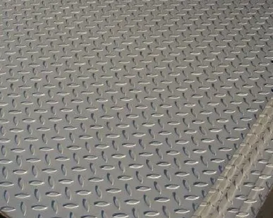 фото Лист рифленый чечевица 10*1500*6000 мм 3сп ГОСТ 8568-77