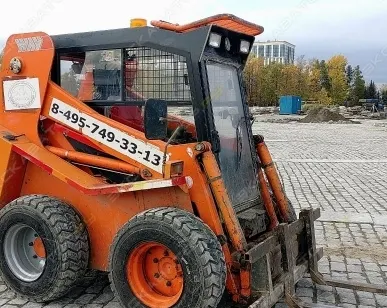 фото Аренда мини-погрузчика Locust L853, Москва