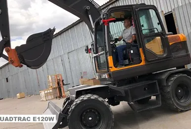 фото Колесный экскаватор Quadtrac E120W