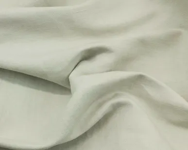 фото Костюмно-плательный лён с вискозой оливковый Италия Состав: лён 82 %, вискоза 18 % Плотность ≈245 г/м² Ширина 158 см