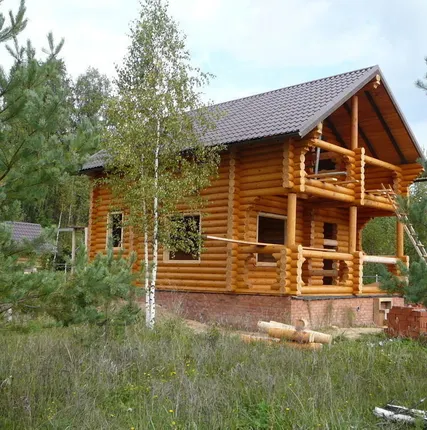 Фото №0 Срубы домов из оцилиндрованного бревна