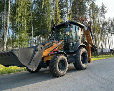 фото Аренда экскаватора погрузчика Case 570ST