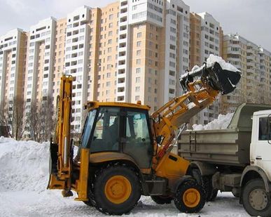 фото Уборка снега - Услуги экскаватора погрузчика