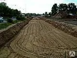 фото Уплотнение грунта в дорожном корыте