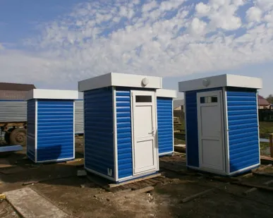 фото Туалетная кабина металлическая двухместная 2х4х2,3м