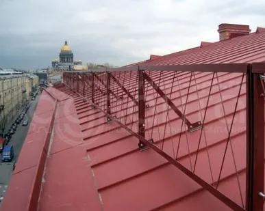фото Кровельный снегозадержатель