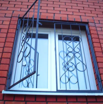 Фото №0 Кованая решетка распашная