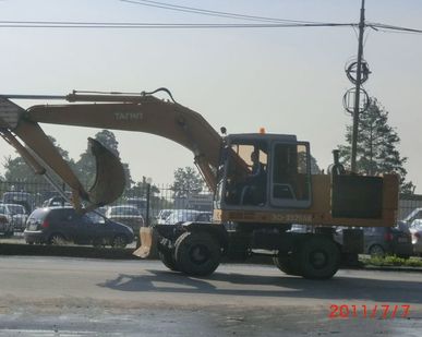 фото Услуги колесного экскаватора ЭО-33211А