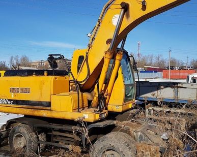 фото Экскаватор колесный Hyundai Robex 2000w-7