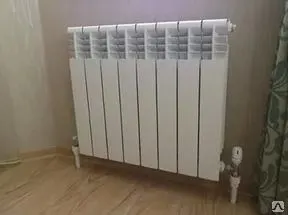 фото Монтаж радиатора отопления