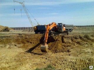 фото Земляные работы (рытьё котлована) механизированным способом с вывозом
