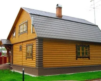 фото Отделка фасада деревом