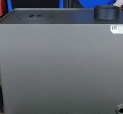 Фото №4 Котел на твердом топливе Каракан 20 ТПЭ 3, 20 кВт с плитой