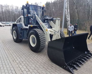 фото ФРОНТАЛЬНЫЙ ПОГРУЗЧИК TL150