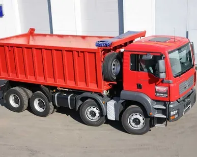 фото САМОСВАЛ MAN TGA 41.480 8х4 BB-WW с кузовом «Бецема» (БЦМ-59, 20 м3)