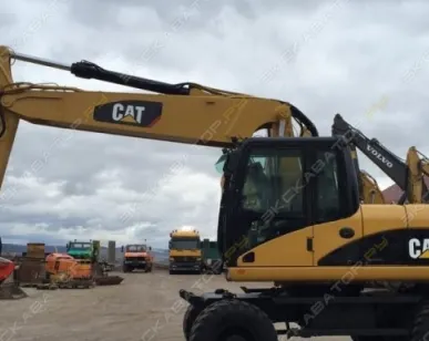 фото Аренда колесного экскаватора Caterpillar M322D, Санкт-Петербург