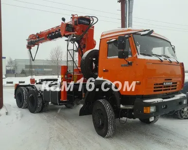 фото КАМАЗ 65111 с кму Kanglim 2056H c буром