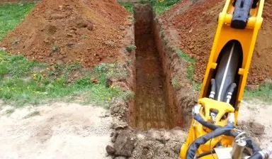 фото Эксковатор погрузчик. Гидромолот