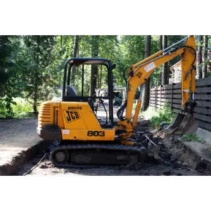 фото Рытье траншей миниэкскаватором BOBCAT 430G