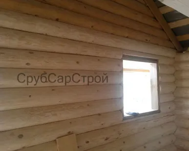 фото Шлифовка сруба эксцентриковыми шлифовальными машинками.