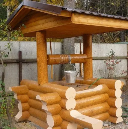 Фото №0 Колодец из оцилиндрованного бревна (сруб)