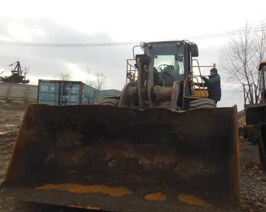 фото Погрузчик John Deere 724K