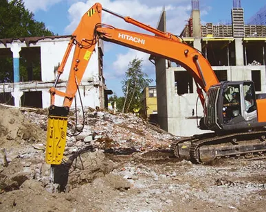 фото Аренда гидромолота на гусеничном экскаваторе